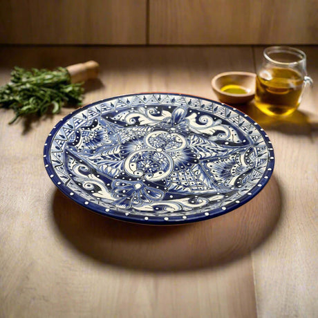 11.5" Talavera Blue & White Dinner Plate | Mexican Dinnerware hand-painted blue and white Talavera ceramic dinner plate on wooden table