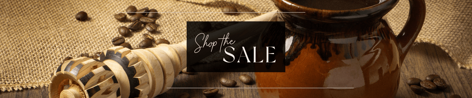 Rustic coffee cup and beans with wooden scoop on burlap - shop the sale banner