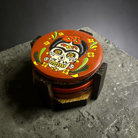 Custom Talavera Coaster | Hand-Painted Mexican Tile Drink Pads featuring hand-painted Día de los Muertos skull floral design on wooden table