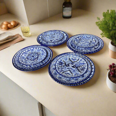 Blue & White Talavera Dinnerware Set | 12-Piece Set hand-painted blue and white Talavera plates on countertop, authentic Guanajuato craftsmanship