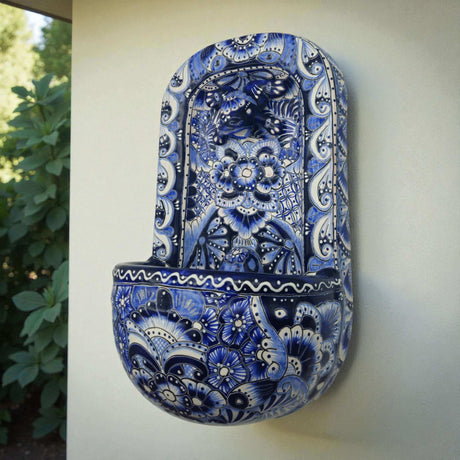 Blue & White Talavera Wall Fountain | Handcrafted Mexican Ceramic - hand-painted blue and white floral ceramic wall fountain with lion-head spout