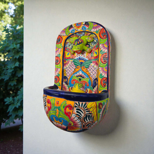Colorful Talavera Wall Fountain | Mexican Ceramic Water Feature hand-painted talavera wall fountain with playful frog and vibrant floral motifs