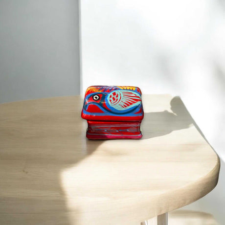 Colorful Hand-Painted Guerrero Jewelry Box | Mexican Ceramic Chest hand-painted red and blue Guerrero pottery jewelry chest on light wood table