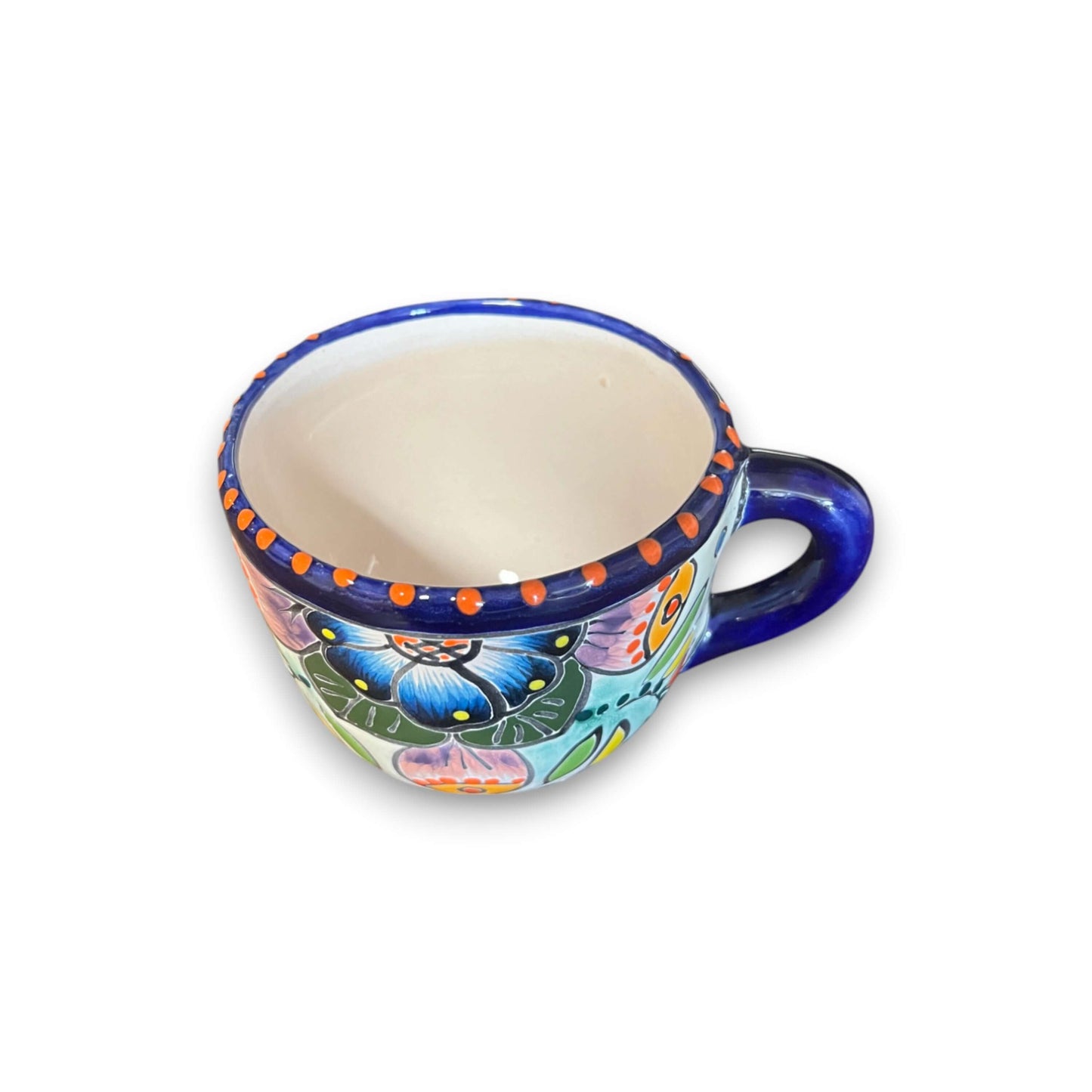 Talavera Coffee Mug | Hand-Painted Mexican Ceramic Cup showing hand-painted floral Talavera patterns, cobalt blue rim and handle, handcrafted in Guanajuato