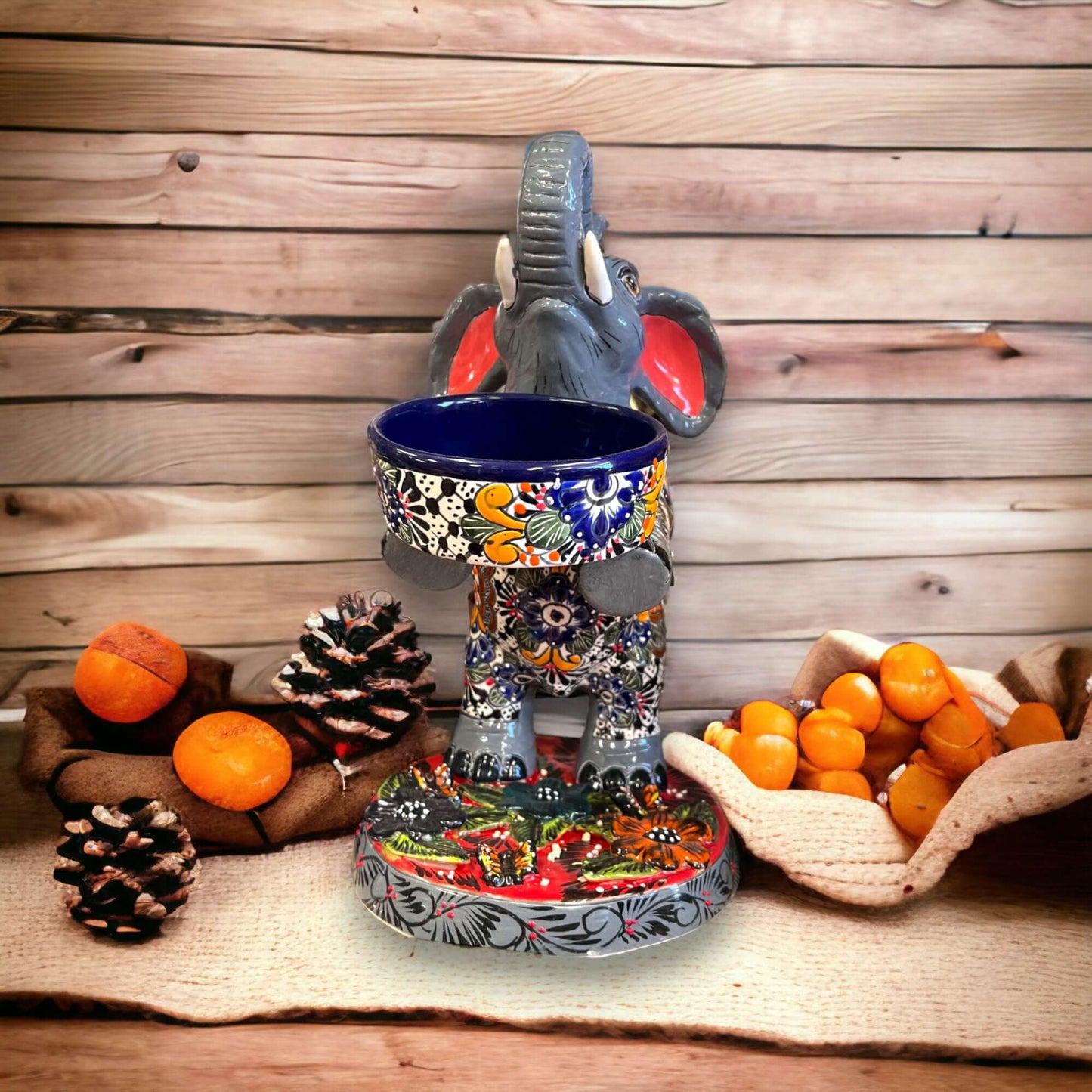 Talavera Elephant Planter | Hand-Painted Ceramic Art - raised trunk succulent planter with colorful floral and geometric motifs, drainage hole