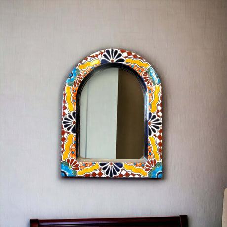 Vibrant Talavera Mirror Wall Art | Colorful Mexican Artisan Decor (Medium) hand-painted arched Talavera mirror with bright floral design on neutral wall