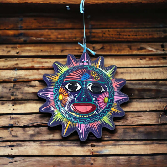 Vibrant Talavera Sun Wall Decor | Hand-Painted Mexican Artisan Craft - colorful hand-painted Talavera sun hanging on wooden wall