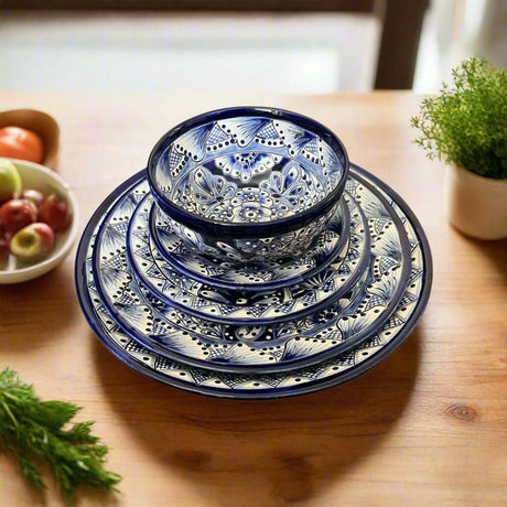 5-Piece Talavera Dinnerware Set | Blue & White Tableware for 1 — handcrafted blue and white Talavera plates and bowls with floral motifs on wooden table