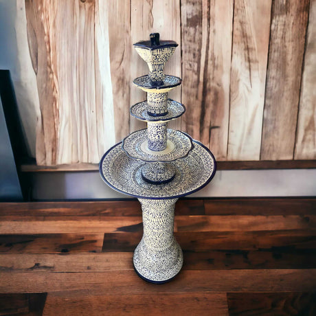 Handcrafted Talavera Fountain | Vibrant Mexican Artwork (4ft Height) - blue white hand-painted tiered Talavera fountain on wooden table