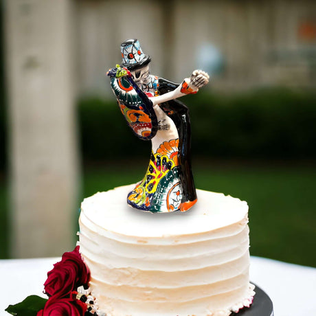 Handcrafted Talavera Cake Topper | Unique Hand-Painted Wedding Art - hand-painted colorful skull couple topper on white cake