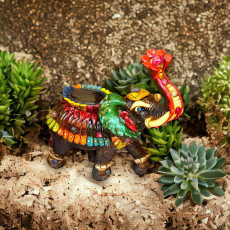 Artisan Crafted Aztec Elephant Statue | Handmade Cultural Decor colorful hand-painted Aztec elephant figurine in succulent display