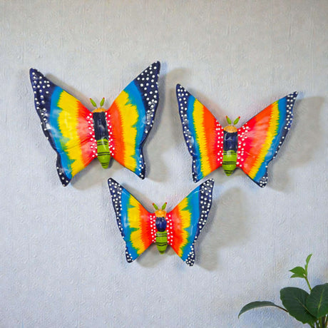 Set of 3 Talavera Butterfly Wall Hangings | Handmade Ceramic Decor vibrant hand-painted Mexican ceramic butterflies on textured wall