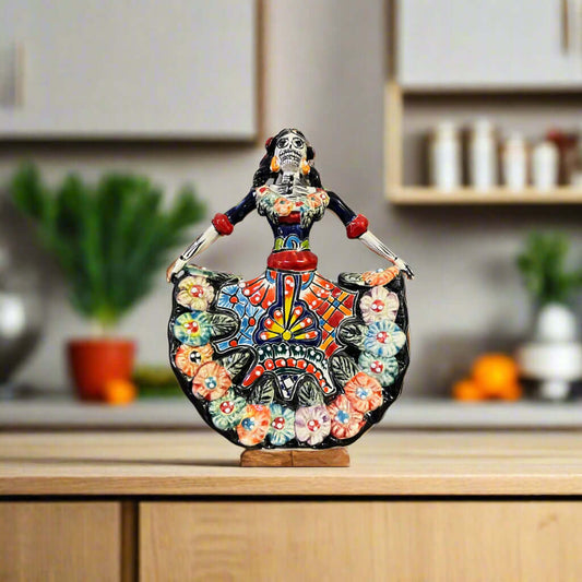 Handmade Talavera Catrina Figurine | Day of the Dead Ceramic Art colorful hand-painted Talavera Catrina on wooden table