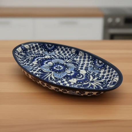 Handcrafted Talavera Oval Platter | Blue & White Mexican Art - hand-painted cobalt floral serving platter on wooden table