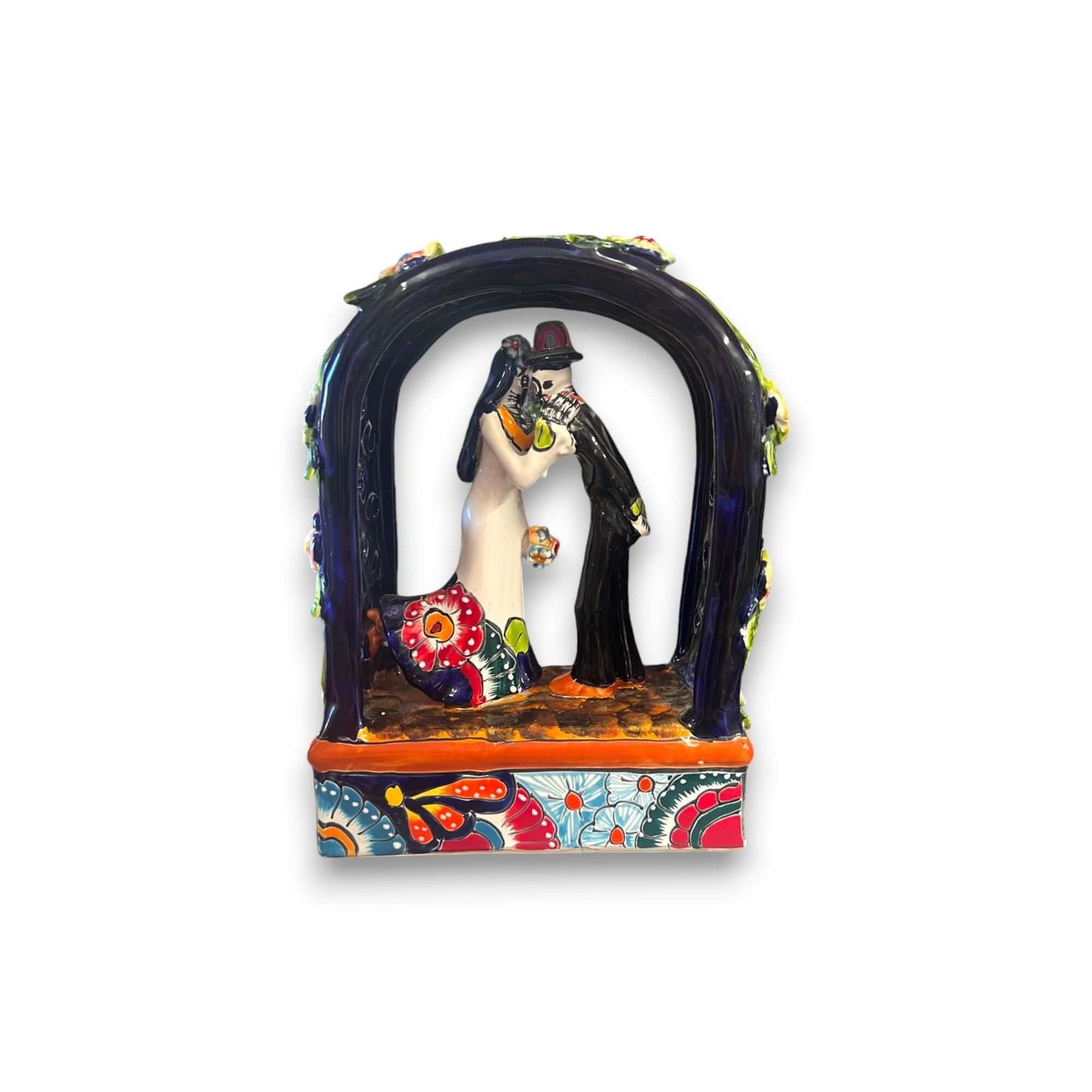 Talavera Day of the Dead Wedding Figurines | Mexican Altar Decor - hand-painted Talavera bride and groom kissing under arch
