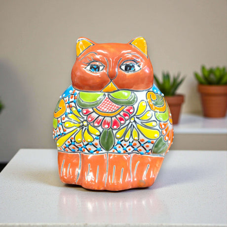 Colorful Talavera Cat Planter | Mexican Ceramic Art - hand-painted fat cat planter with bright orange, yellow, green and blue floral patterns