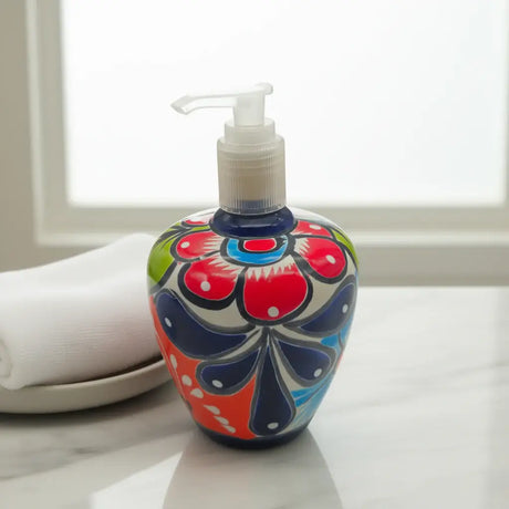 Talavera Floral Soap Pump | Hand-Painted Ceramic Dispenser - hand-painted rounded bulb ceramic soap dispenser with bright blue red green floral motifs
