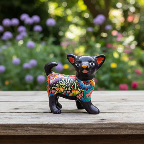 The Talavera Hub black ceramic Chihuahua figurine with colorful floral and geometric Talavera patterns. Hand-painted Mexican art.
