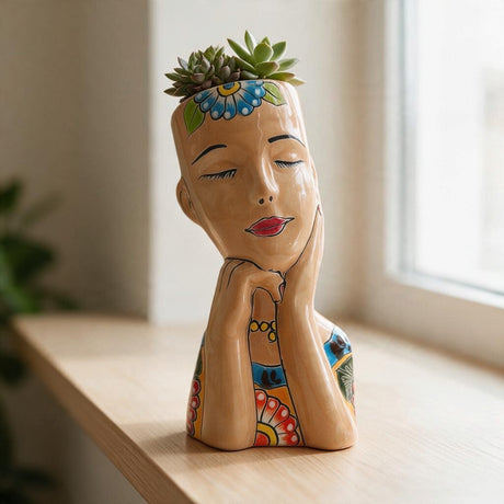 Talavera lady face planter with succulents in a lifestyle setting