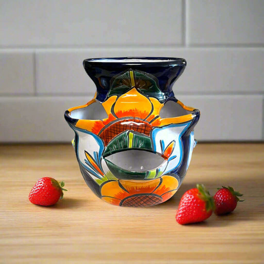 Talavera Strawberry Planter | Sunflower Lily Design hand-painted sunflower and lily ceramic planter with strawberries on wood surface