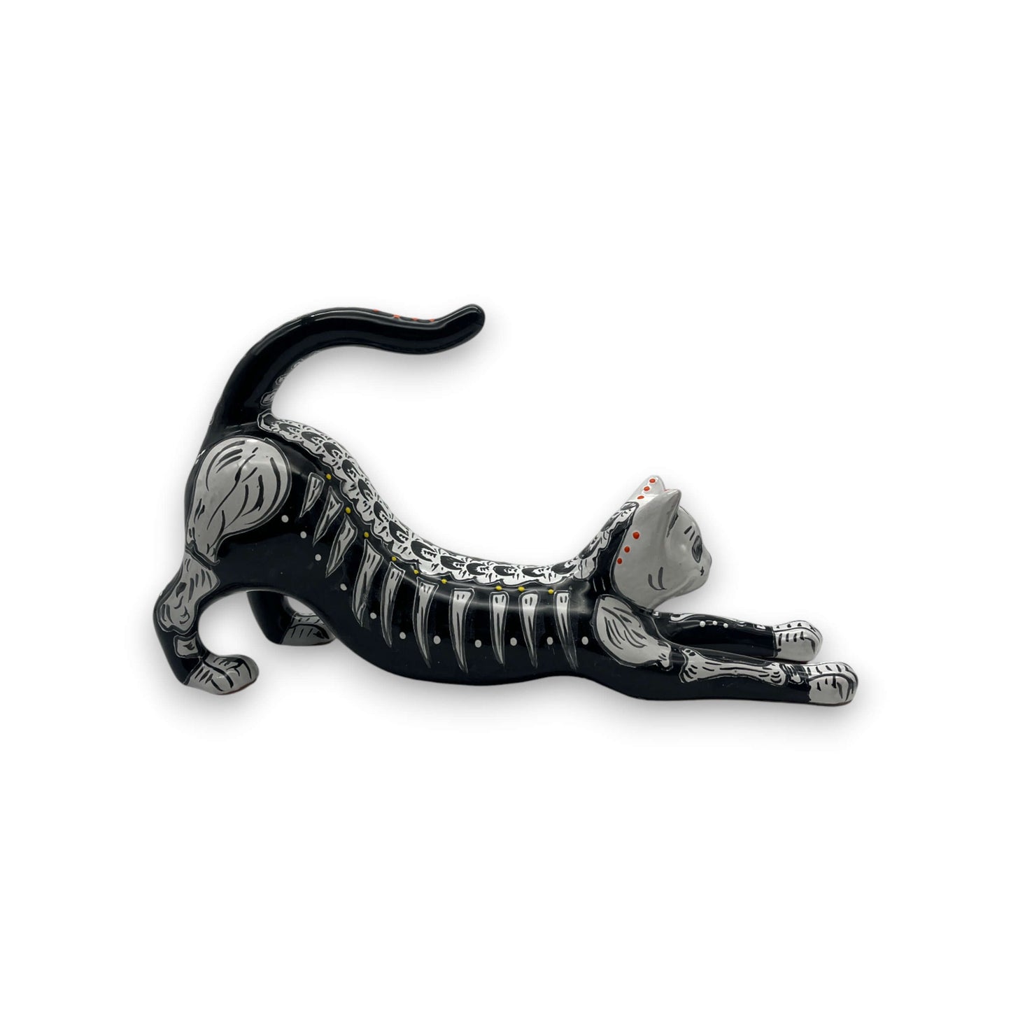 Talavera Stretching Cat Figurine | Hand-Painted Calavera Art - black hand-painted stretching cat with white skeletal accents and red floral details