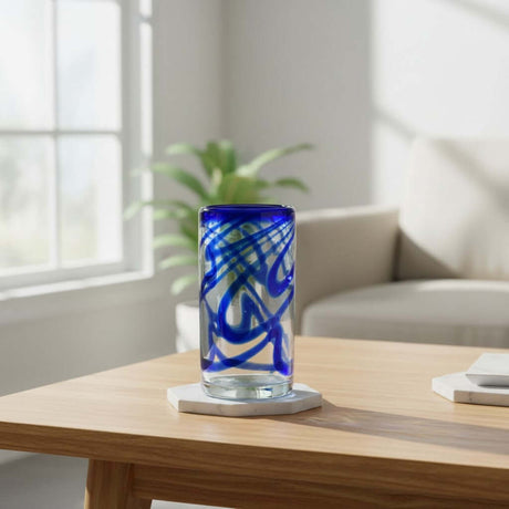 The Talavera Hub hand-blown glass with blue swirl design, 20 oz capacity, 6" tall.