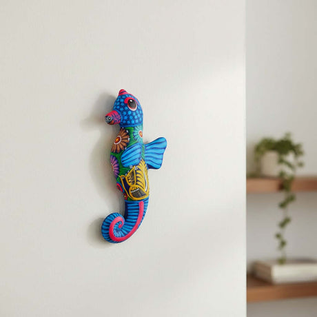 The Talavera Hub handcrafted ceramic seahorse wall art with vibrant, hand-painted Mexican folk-art patterns.