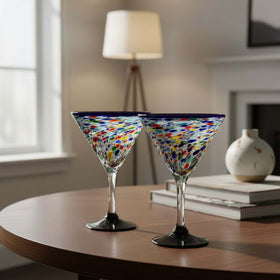 The Talavera Hub hand-blown glass martini glass with confetti pattern and blue rim. Holds 12 oz.