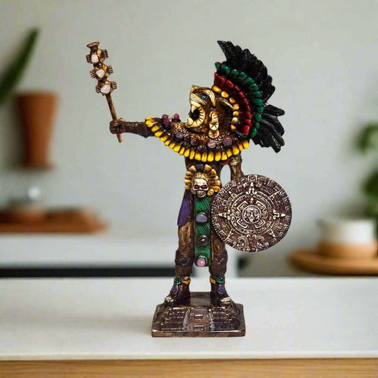 Aztec Warrior Statue | Handcrafted Cultural Sculpture - handcrafted Aztec warrior figurine with feathered headdress, staff and shield, detailed vibrant finish