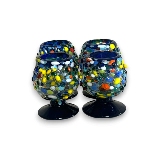 Confetti Rock Shot Glass | Blue Rim Cognac Style – hand-blown multicolored fused glass shot glass with deep blue rim and pedestal base