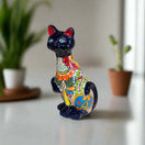Talavera Cat Statue | Hand-Painted Mexican Ceramic Figurine - dark blue glossy face with multicolor floral pattern, handmade in Guanajuato, Mexico
