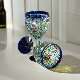 Hand Blown Mexican Wine Glasses | Blue Rim Confetti Design - pair of hand-blown lead-free glasses with cobalt blue rim and colorful confetti pattern