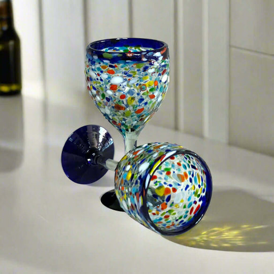 Hand Blown Mexican Wine Glasses | Blue Rim Confetti Design - pair of hand-blown lead-free glasses with cobalt blue rim and colorful confetti pattern