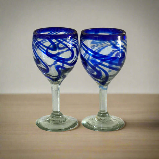 Hand-Blown Mexican Wine Glass | Cobalt Blue Swirl Goblet handcrafted clear bowl with cobalt ribbon swirls, classic goblet silhouette