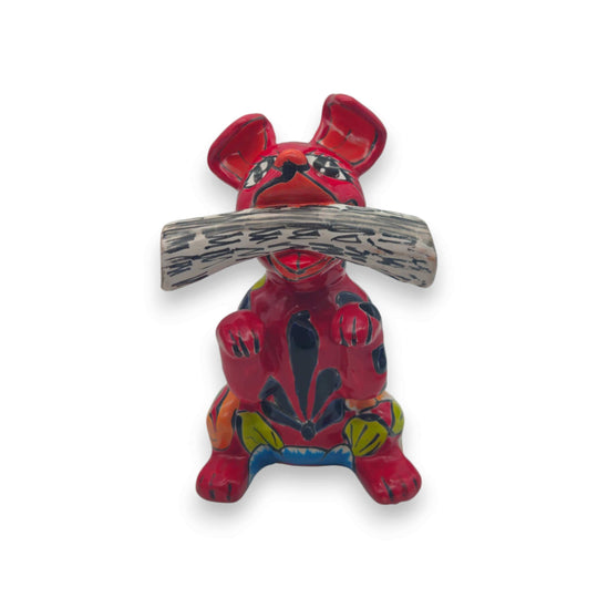 Talavera Dog Holding Newspaper Statue | Colorful Mexican Garden Art - hand-painted red Talavera dog with newspaper and floral motifs