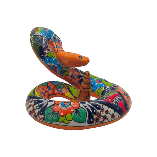 Colorful Talavera Snake Sculpture | Handmade Ceramic Art hand-painted coiled snake with bright orange, blue and green floral Talavera patterns
