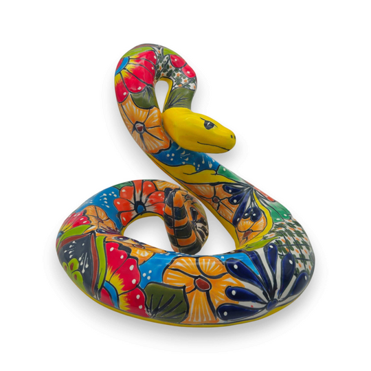 Colorful Talavera Snake Sculpture | Handmade Ceramic Art — hand-painted coiled snake with bright orange, blue, green and red floral Talavera patterns