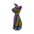 Alebrije Sitting Dog Statue | Hand-Painted Decorative Art showcasing vibrant colors and intricate designs.