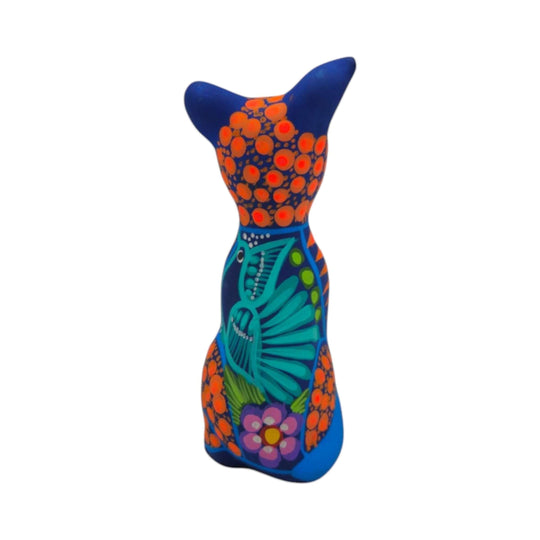 Alebrije Sitting Dog Statue | Hand-Painted Decorative Art featuring vibrant colors and intricate designs.