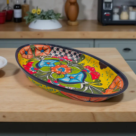 Extra Large Oval Talavera Platter | Hand-Painted Mexican Serving Dish on wooden kitchen table.