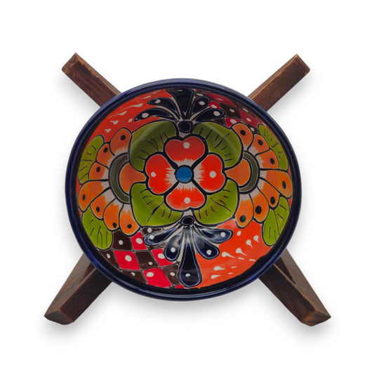 Alt Tag: 5" Colorful Talavera Bowl | Handcrafted Mexican Folk Dish - hand-painted floral red blue green yellow design with cobalt rim on wooden stand