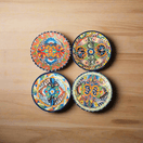 6" Talavera Ceramic Dinner Plate | Authentic Mexican Dinnerware - set of four hand-painted 6-inch Talavera plates on wooden table