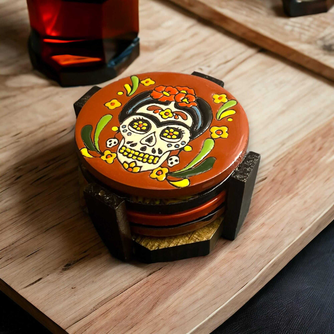Custom Talavera Coaster | Hand-Painted Mexican Tile Drink Pads featuring hand-painted Día de los Muertos skull floral design on wooden table