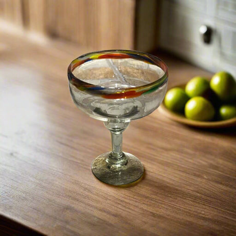 Hand-Blown Colorful Margarita Glass | Confetti Rim - hand-blown lead-free glass with festive colorful confetti rim on wooden counter