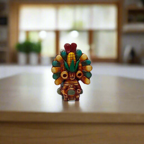 Handcrafted Mexican Shot Glass | Aztec Warrior Design with colorful hand-painted Aztec warrior figure, handcrafted in Guanajuato, Mexico