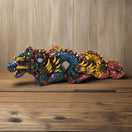 Handmade Aztec Dragon Statue | Cultural Art (Medium Size) colorful handcrafted Aztec dragon statue with detailed scales and gold accents on wooden surface