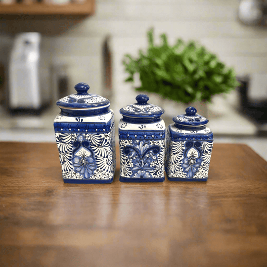 Blue Talavera Canister Set | Handmade Mexican Ceramic Jars on wooden counter, hand-painted blue and white floral Talavera pattern