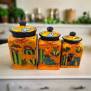 Talavera Canister Set | Colorful Handmade Panchito Pottery - three hand-painted Mexican ceramic kitchen canisters with cactus and Panchito desert design