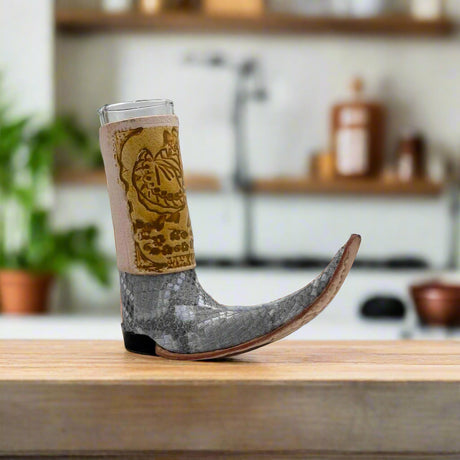 Cowboy Boot Shot Glass | Authentic Mexican Leather-Wrapped Glass - hand-blown glass with stamped floral leather wrap and curled boot toe