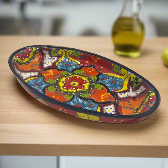 XL Oval Talavera Platter | Hand-Painted Mexican Serving Dish with vivid multicolor floral and geometric motifs, deep blue rim, handcrafted in Guanajuato